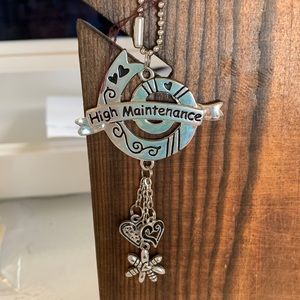 Ball and socket keychain spiral “high maintenance “ with 3 dangling charms. NWT